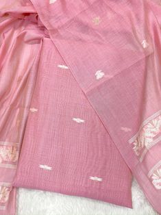 Product Details Pink Floral Leaf Unstitched Salwar Suit in Muga Cotton Elevated with Thread Woven Work Accompanied by an Unstitched Kurta, Bottom and Dupatta with Tassels Comes with the Vishnu Weaves Promise of Premium Quality Size & Fit Kurta & Bottom : 5.50 Mtrs Dupatta : 2.30 Mtrs Material & Care Dry Wash Only Pink Cotton Silk Lawn Suit With Traditional Drape, Pink Unstitched Raw Silk Suit, Pink Raw Silk Unstitched Suit, Traditional Pink Cotton Silk Lawn Suit, Traditional Pink Lawn Suit, Traditional Pink Lawn Suit For Transitional Season, Transitional Pink Unstitched Suit With Resham Embroidery, Traditional Pink Cotton Silk Unstitched Suit, Cotton Lawn Suit With Cutdana For Wedding