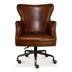 a brown leather office chair with casteors and wheels