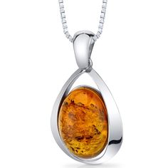 Unravel hidden wonders Intense and earthy, this piece promises an exceptional experience. This versatile pendant features an oval shape Peora natural Baltic Amber gemstone in .925 sterling silver. Our natural Baltic Amber gemstones are a unique gift from nature. By cutting them in a way that respects the rough's natural radiance, we ignite their inherent intensity and maximize their brilliance to deliver on our signature Peora standard. Handcrafted in pure .925 sterling silver goodness, this pendant has been carefully coated in an elegant rhodium finish. Our artisans are expertly trained in this process which fortifies the pendant's strength, shine and brilliance. Main Stone Genuine Baltic Amber Oval shape Orange color Metal .925 Sterling Silver 925 stamp, 3.9 grams Sizing Pendant measures Large Pendant Necklace, Amber Gemstone, Cognac Color, Couple Necklaces, Discount Jewelry, Mom Jewelry, Amber Stone, Disc Pendant, Baltic Sea