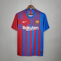 a soccer jersey hanging on a hanger