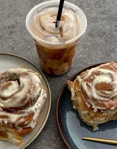 two plates with pastries on them next to a cup of coffee