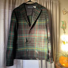 Crafted Of Plaid Tweed, Polo Ralph Lauren’s Sports Coat. Features: Button Cuffs. Notch Lapels Long Sleeves, Button Cuffs Chest Patch Pocket Side Flap Pockets Button-Front Closure Plaid Long Sleeve Blazer With Welt Pockets, Long Sleeve Plaid Blazer With Welt Pockets, Plaid Wool Sport Coat With Welt Pockets, Wool Plaid Sport Coat With Welt Pockets, Casual Fitted Tweed Jacket With Buttons, Fitted Casual Tweed Jacket With Buttons, Casual Business Tweed Jacket With Button Closure, Business Casual Tweed Jacket With Buttons, Casual Single Breasted Tweed Jacket For Work