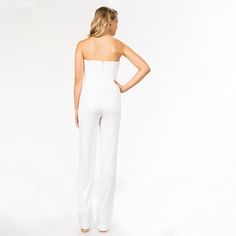 The Andy Jumpsuit in Lily dazzles with two-tone sequins from top to bottom. This glittery ensemble features a strapless semi-sweetheart neckline that shows off the shoulders and decolletage. Floor-length wide-leg pants create a straight silhouette to elongate the body. The white sequins create abstract patterns when pushed and manipulated in different directions with one side shiny and one side matte. Strapless Sweetheart Neckline, Strapless Jumpsuit, Dress The Population, Fitted Bodice, Sweetheart Neckline, Leg Pants, Floor Length, Wide Leg Pants, Off The Shoulder