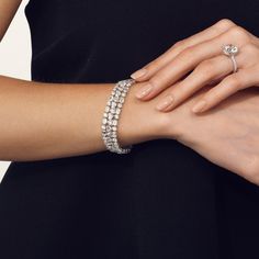 Round, pear, and marquise diamonds merge together for their impeccable fire and scintillation to form a diamond bracelet that effortlessly captivates discerning eyes, making a perfect jewel to mark milestone moments.