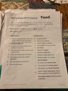 a paper with instructions on how to make spaghetti sauce for dinner or dessert, sitting on a quilted tablecloth