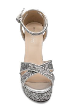 Crisscross vamp straps add contemporary dimension to an sequin-adorned sandal lifted by a chunky platform and towering block heel. 4 1/2" heel; 1 1/2" platform Adjustable ankle strap with buckle closure Cushioned footbed Water resistant Synthetic upper, lining and sole Imported Chunky Platform, Platform Sandals, Criss Cross, Block Heels, Ankle Strap, Womens Sandals, Ups, Sequin, Water Resistant