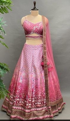 This Lehenga Choli is Ready to Wear A stunning lehenga with beautiful Embroidered Silk blouse, dupatta and lehenga, designed specially for wedding season. mesmerizing Pink Lehenga Set that captivates with its elegant print. The eye-catching lehenga is crafted in silk with stones work. It is paired with a Silk blouse having applique embroidery and a dupatta having Net & Beautiful Boder. Style it with statement jewellery and heels for a wedding or an engagement ceremony, showcasing style and sophistication. Blouse & Lehenga Fabric - Silk Inner Fabric - Silk Dupatta Fabric - Net Color _Pink & Multi Color Style - Engagement ceremony Lehenga Embroidery -stones NOTE : Originally stitched in size 36 but can be altered for size 34 without any extra cost. Semi-stitched Meenakari Sets For Reception, Bollywood Style Dola Silk Lehenga With Meenakari, Diwali Reception Lehenga With Meenakari Detailing, Diwali Reception Lehenga With Meenakari, Festive Fitted Meenakari Lehenga, Semi-stitched Floor-length Meenakari Sharara, Semi-stitched Meenakari Lehenga In Traditional Drape, Designer Semi-stitched Meenakari Lehenga, Semi-stitched Lehenga With Meenakari In Traditional Drape