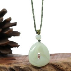 Design concept--- Genuine White Jade Infinity Pendant Necklace. This pendant is made with genuine nephrite white jade. The jade texture is so smooth and translucent. It's very perfect without flaws. The handcraft is great with a infinity style. It's completely cool and affordable with perfect white jade. It's a special gift for yourself or your love. Total weight: 11.62 g Excellent craftsmanship Chain type: Nylon String Genuine White Nephrite Jade Authenticity Guaranteed, backed by a 100% money- White Jade Round Pendant Necklace, White Jade Jewelry For Meditation, Handmade White Jade Necklaces, White Jade Necklace With Natural Stones, Infinity Pendant, Nephrite Jade, White Jade, Jade Jewelry, Jade Pendant