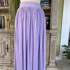 Unwine Skirt Size S Pastel Lavender 1.75" Wide Elasticized Waistband Jersey Knit Full Gathers Pockets In Side Seams Waist: 27.5" Length: 31.5" (Measured Down Center Back From Top Of The Waistband) Nwot Retail $121.00 Purple Flowy Skirt With Elastic Waistband, Purple Stretch Skirt With Elastic Waistband, Spring Purple Pleated Maxi Skirt, Flowy Lavender Lined Skirt, Lavender Flowy Lined Skirt, Fitted Purple Pleated Maxi Skirt, Purple Pleated Flowy Maxi Skirt, Relaxed Purple Pleated Maxi Skirt, Purple Relaxed Pleated Maxi Skirt