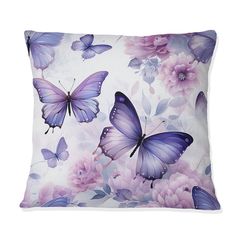 purple butterflies and pink flowers on a white background with blue trimmings are featured in this decorative pillow case