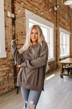 Stay warm and stylish in the Lillie Oversized Sweatshirt, perfect for any occasion. Come in sizes S-2XL to fit everyone's needs with an extra-roomy, comfortably snug fit. Look fashionable and feel cozy - what more could you want? Model Info: Models are 5'7", Size 2, wearing smalls Fabric: 75% polyester 25% cotton Sizes Bust Shoulder Sleeve_Length Length Hem_Width Relax Relax Relax Relax Relax S 45.7 29.7 19.9 29.5 40.9 M 48.0 30.9 20.1 30.3 43.3 L 50.4 32.1 20.3 31.1 45.7 XL 53.5 33.7 20.5 31.9 Oversized Sweatshirt, Black Fabric, Shoulder Sleeve, Stay Warm, Snug Fit, Size 2, Sweatshirts Hoodie, Sleeve Length, Wardrobe