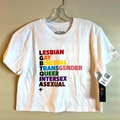 Lgbtqia+ Lesbian Gay Bisexual Transgender Queer Intersex Asexual Tee * Phluid Project Pride Collection * Rainbow * Unisex Cropped T-Shirt * Women’s Cut * Short Sleeve * Size Medium * 100% Cotton White With Black Red Orange Yellow Green Purple Brown Pink And Blue Lettering. Nwt - New And Unworn. Mailed From A Smoke-Free & Pet-Free Home Office. Bundle Items To Save On Shipping! Phluid Project Tag Reads: “The Phluid Project Exists To Empower Individuals The Freedom To Be Who They Want To Be, To Exp Pride Collection, Interactive Stories, Red Orange Yellow, Cropped T Shirt, T Shirt Women, Shirt Women, The Freedom, Our World, Green And Purple