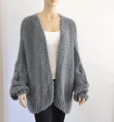 Cozy Gray Acrylic Outerwear, Cozy Mohair Soft Knit Outerwear, One Size Chunky Knit Acrylic Sweater Coat, Oversized Cozy Acrylic Knitting Pattern, Cozy Oversized Acrylic Knitting Pattern, Cozy Mohair Sweater Coat With Chunky Knit, Cozy Gray Chunky Knit Cardigan, Cozy Mohair Knitted Outerwear, Mohair Chunky Knit Cozy Sweater Coat