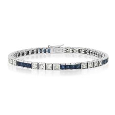 18K white gold with 5.60-carat blue sapphire diamond princess tennis bracelet. Model Number: SDL2600WY Bracelet Model, Diamond Princess, Studded Necklace, Diamond Tennis Bracelet, Blue Sapphire Diamond, Deco Jewelry, Tennis Bracelet Diamond, Princess Diamond, Anniversary Gift For Her