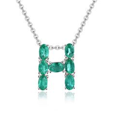 Introducing our H Initial Necklace, a delightful and personalized accessory for women. This Emerald Letter Necklace is a perfect choice for those born in May, featuring a May Birthstone Letter Pendant with gorgeous green gemstones. Crafted with care, the pendant is made from S925 Silver, weighing just 0.95 grams. The beauty of this necklace lies in the 1.57 carats of emeralds, forming a charming H shape with six oval-cut stones. This unique design adds a touch of elegance and personal flair to the piece. Whether you're looking for a thoughtful gift or a stylish addition to your own collection, the Emerald H Initial Necklace is a beautiful representation of individual style and May birthstone celebration. 💚✨ Green Round Emerald Necklace With Gemstone Accents, Green Emerald Necklace With Gemstone Accents, Round Green Emerald Necklace With Gemstone Accents, Green Emerald Necklace Gift, Green Sterling Silver Necklaces With Gemstone Accents, Green Gemstone Sterling Silver Necklaces, Green Gemstone Accented Sterling Silver Necklace, Elegant Personalized Green Necklace, Green Gemstone Birthstone Necklace For Anniversary