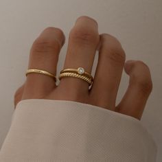 The best stacking set you'll find! This is a versatile combination of 3 rings, that are great together or mixed with other rings. There's texture, simplicity and some bling - the perfect combination for stacking rings! - - - D E T A I L S - - -  * Made of 925 Sterling Silver * THICK plating of 14k Gold or Rhodium * Nickel-free & Hypoallergenic  * Sold as a Set of 3  Not sure of your ring size? We recommend getting our ring sizer!  https://www.etsy.com/listing/1240904225/ring-sizer-reusable-ring-sizer-plastic?click_key=9fae8f5333500ea7ab6397fe5c99715c01abd88f%3A1240904225&click_sum=fa895eb7&ga_search_query=ring%2Bsizer&ref=shop_items_search_1&pro=1&sts=1 Made with 100% Pure Love ♡ Happy to answer any questions you may have! Comes in a gift-box ready for gift-giving! Let's Connect! 🥰 IG: sa Minimalist Rings Stacking Rose Gold, White Dainty Stackable Rings, Luxury Minimalist Stackable Rings For Everyday, Luxury Dainty White Gold Stackable Rings, Cheap Trendy Stackable Open Rings, Luxury Adjustable Dainty Stackable Rings, Luxury Minimalist Engraved Stackable Ring, Affordable Trendy Open Stackable Rings, Luxury Minimalist Round Stackable Rings