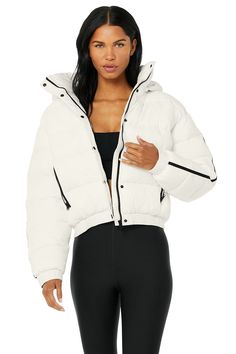 Your new outerwear obsession: the Aspen Love Puffer Jacket. Crafted with high-tech ripstop fabric, this regular-length puffer locks in warmth during cold weather months. Snap front buttons and side zip pockets keep this jacket on-trend while the removeable hood lets you adjust your cozy look as desired. Street-ready, water-resistant ripstop Designed & uniquely fit to flatter every size Wear-tested by our in-house team for the perfect fit Alo Yoga® | Aspen Love Puffer Jacket in Ivory, Size: L Yoga Jacket, Ripstop Fabric, Back Women, Alo Yoga, Yoga Clothes, Puffer Jacket, Aspen, High Tech, Side Zip