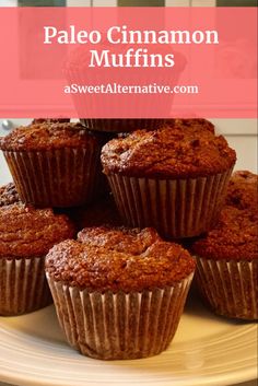 a white plate topped with muffins on top of a table