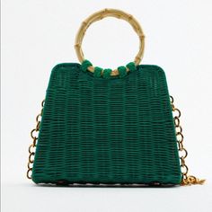 City Bag With Rattan Exterior. Lined Interior. Handles And Removable Metal Chain Crossbody Strap. Magnetic Closure. Green Shoulder Bag With Chain Strap For Spring, Spring Green Shoulder Bag With Chain Strap, Green Bag With Chain Strap For Daily Use, Green Bags With Chain Strap For Daily Use, Summer Shoulder Bag With Chain Strap And Top Handle, Summer Top Handle Shoulder Bag With Chain Strap, Green Square Bag With Chain Strap, Casual Green Bag With Chain Strap, Green Chain Strap Bag For Errands