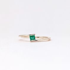 Natural Fine Emerald Ring. Baguette Stone Ring. Precious Gemstone Ring in 14k SOLID GOLD For Her from our Capsule Jewelry Collection. Emerald Baguette Gemstones are set in Chenal Setting in our Factory. Gold Ring AA+ Quality. Perfect Gift For Everyday or May Birthstone Gift for Your Loved Ones. ►  DIMENSIONS : ◆ Gemstone : Emerald 0.30 Cts         ◆ Stone size : 3*3 mm  Sapphire                                      ◆ Shank Width : 1 mm      ◆  Material :  14k Yellow Gold          Made to Order      EACH Ring is Stamped With 585 Marked As 14k GOLD International Standard. All my gemstones are hand-selected for best quality assurance, then precisely sawed, and shaped into the desired geometry. The precious stones are then delicately grinned, sanded, and hand-polished to make sure each Ring ha Sterling Silver Emerald Ring With Baguette Cut, Baguette Cut Emerald Ring In Sterling Silver, 14k White Gold Stackable Emerald Cut Rings, White Gold Baguette Cut Rings For Everyday, Stackable Emerald Cut Sterling Silver Rings, Stackable Emerald Cut White Gold Rings, Sterling Silver Ring With Baguette Cut Green Stone, Green Sterling Silver Baguette Cut Rings, Dainty Emerald Cut Bezel Set Rings