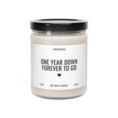 a candle that says one year down forever to go on the front and back of it