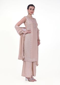 Arya Georgette Tiki Resham Embroidered Palazzo Suit. Readymade premium georgette fabric Enhanced with tiki & resham embroidery work Comes with dupatta, palazzo pants Sleeves attached as per image. Experience elegance and comfort with our Arya Palazzo Suit. Made with high-quality georgette fabric and featuring stunning Tiki Resham embroidery, this suit is perfect for any occasion. The palazzo pants provide a relaxed fit and added convenience. Anarkali Palazzo Set With Intricate Embroidery, Elegant Georgette Palazzo Set For Reception, Designer Georgette Palazzo Set With Intricate Embroidery, Reception Palazzo Set With Resham Embroidery In Chinon, Elegant Georgette Pant Set For Reception, Chinon Palazzo Set With Resham Embroidery For Reception, Chinon Straight Kurta Set For Reception, Resham Embroidery Chinon Palazzo Set For Reception, Elegant Designer Pant Set With Chikankari Embroidery