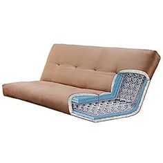 a brown futon with blue and white designs on it