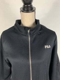 Fila Sport Jacket Size XL Color: black Material: polyester and cotton bag 18LJN Black Cotton Track Jacket For Outdoor, Black Functional Cotton Track Jacket, Black Cotton Outdoor Track Jacket, Black Track Jacket With Zipper For Fall, Black Casual Track Jacket With Zipper, Black Cotton Track Jacket With Pockets, Casual Black Track Jacket With Zipper, Casual Black Track Jacket With Zipper Closure, Black Fleece Jacket With Zipper Closure