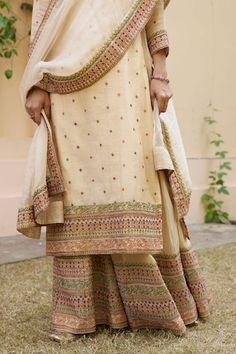 Cream kurta with multicolor thread embroidery in bloom pattern. Paired with border embroidered sharara and dupatta. - Aza Fashions Kurta And Sharara, Embroidered Sharara, Women Kurta, Straight Kurta, Sharara Set, Thread Embroidery, Set Women, In Bloom, Embroidery Thread