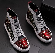 The iconic God Bless sneaker has been redesigned with this bold version showcasing the meticulous work of hand-placing a 60-piece stars embellishment. Mounted on a rubber sole, it features panels in satin and patent leather on its back counter. With a grosgrain piping finish, the pair give birth to this signature model molded in Neoprene for comfort.[custom tab]UPPER #1: 100% COW LEATHER | UPPER #2: 100% COW SPLIT LEATHER | UPPER #3: 100% COTTON | UPPER #4: 100% POLYESTER | INSERT #1: 100% ACRYL Tenis Gucci, Hip Hop Shoes, Casual Punk, Punk Shoes, Shoe Shine, Flat Sneakers, High Top Shoes, Shoes For Men, Look Cool