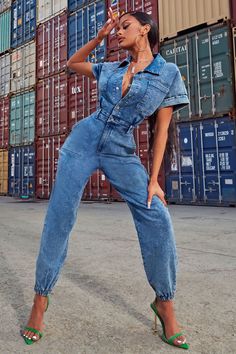 Available In Denim. Denim Jumpsuit Short Sleeve Collard Button / Snap Front Functional Front Pockets Functional Front Zipper Belt Loops Jogger Pant Stretch 27" Inseam Disclaimer: Due To The Specialized Wash Process, Each Garment Is Unique. 85% Cotton 13% Polyester 2% Spandex Imported | Daniela Denim Jumpsuit size 3X by Fashion Nova Overalls With Button Down Shirt, Denim Jumpsuit Street Style, Jeans Jumpsuit Outfit, Denim Jumpsuit Short, Jean Jumpsuit Outfit, Blue Jean Jumpsuit, Denim Jumpsuit Outfit, Jumpsuit Short Sleeve, Denim Photoshoot