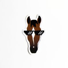 a sticker depicting a horse wearing sunglasses