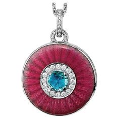 Victor Mayer customizable round locket pendant necklace 18k white gold, Opera Collection, translucent pink vitreous enamel, guilloche, 37 diamonds, total 0.37 ct, G VS, brilliant cut, 1 aquamarine, diameter app. 26.0 mm About the creator Victor Mayer Victor Mayer is internationally renowned for elegant timeless designs and unrivalled expertise in historic craftsmanship. Lovers of the extraordinary appreciate the beauty of Victor Mayer's designs, which use extremely rare techniques such as genuine enamel or elaborate engravings. Since 1890, the company has stood for the finest jewellery Hand Made in Germany. It is an open secret that the most renowned brands, such as Fabergé, entrust the company with the production of their most exquisite collections. Reference: V1443/RO/13/00/101_V1111/00/ Round Locket Necklace, Enamel Locket, Diamond Locket, Round Locket, Vitreous Enamel, Anchor Chain, Locket Pendant Necklace, Pink Enamel, Drop Necklace