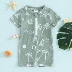 Soak up the sun in style with our PALM TREE Swimsuit! Designed for baby boys, this short sleeve swimsuit is the perfect addition for summer beach days. Keep your little one looking cool and feeling comfortable all season long. Toddler & Baby Boy Style, Bathing Suit Designs, Baby Swimsuit, Long Sleeve Swimsuit, Mommy And Me Dresses, Newborn Boy Clothes, Green Swimsuit, Toddler Boy Fashion, Girl Onesies