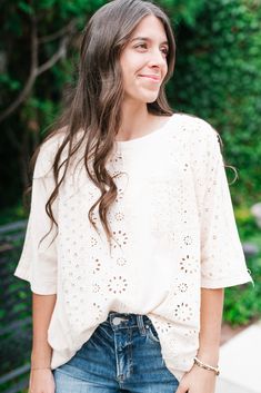 Delicate and timeless, the Keep It Eyelet Short Sleeve Top is the perfect blend of feminine charm and everyday versatility. Featuring intricate eyelet detailing throughout, this top offers a soft, romantic feel while staying comfortable and breathable. The short sleeves and lightweight fabric make it ideal for layering or wearing on its own during warmer days. Pair it with your favorite jeans or skirt for a chic, effortless look that works for any occasion. This top is a must-have for the modern Feminine Spring Top With Cutwork Hem, Feminine Spring Tops With Cutwork Hem, Spring Casual Blouse With Cutwork Hem, Casual Summer Blouse With Cutwork Hem, White Relaxed Fit Eyelet Top, Chic Spring Tops With Cutwork Hem, Spring Short Sleeve Blouse With Cutwork Hem, Spring Blouse With Cutwork Hem And Short Sleeves, Spring Short Sleeve Top With Cutwork Hem