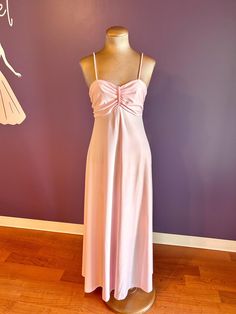 Brand: (no tag) Estimated Size: 2-4 Era: 70s Measurements (taken flat): pit to pit: 15 3/4" waist: 14 1/2" top of shoulder/strap to hem: 54" Amazing 1970s empire waist pastel pink dress! In very good condition. There are tiny marks in the fabric on the bust and on the back near the zipper (circled in photos) please examine pictures closely before purchasing! Pink Empire Waist Dress, Pastel Pink Dress, Spaghetti Strap Maxi Dress, Empire Waist Dress, Rose Pastel, Empire Waist, Pastel Pink, Vintage 70s, Dress Clothes For Women