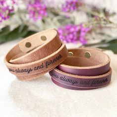 Introducing our NEW personalized laser engraved triple wrap leather bracelet. This customizable and adjustable boho style cuff can be engraved with a name or special message on the outside, inside or both sides of the bracelet, making it an ideal gift for that special someone. Meticulously handcrafted, these triple wrap bracelets are created with two luxurious and enduring Horween leather colors. With four options of top-quality hardware colors and three distinct laser engraved fonts, you have the creative freedom to design a truly unique bracelet. Each order includes one handcrafted leather bracelet. If personalization is selected, we kindly request that you carefully review your choices before placing your order. Please ensure the accuracy of the letter(s)/initial(s)/symbol(s) are correc Adjustable Double Band Wrap Bracelet Gift, Adjustable Double Band Cuff Bracelet As Gift, Adjustable Double Band Wrap Bracelet, Adjustable Cuff Bracelet With Engraving Option For Gift, Double Band Bracelets With Leather Strap As Gift, Double Band Leather Strap Bracelets As Gift, Leather Strap Double Band Bracelets Ideal For Gifts, Double Band Leather Strap Bracelet Gift, Brown Leather Wrap Bracelet For Gift