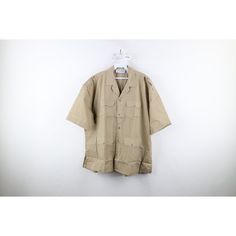 Vintage 70s Streetwear Mens 2XL Multipocket Safari Bush Camp Button Shirt Beige Mens Button Shirt Comes from a smoke-free household Mens size 2XLarge Measurements are: 26.5 inches underarm to underarm 29 inches top to bottom Beige 65% Polyester 35% Cotton US Shipping is FREE, Canada is $15 and International is $24 Check out my other items in my store! W103 Collared Utility Shirt With Pockets, Utility Collared Shirt With Side Pockets, Beige Relaxed Fit Camp Shirt With Pockets, Khaki Collared Shirt With Buttoned Pockets, Khaki Collared Camp Shirt With Pockets, Khaki Collared Utility Shirt, Beige Collared Short Sleeve Shirt With Pockets, Beige Cotton Short Sleeve Shirt With Pockets, Khaki Camp Shirt With Relaxed Fit And Pockets