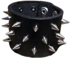 Punk Style Studded Leather Bracelet, Punk Leather Bracelet With Studs, Edgy Leather Bracelet With Studs, Edgy Leather Bracelet With Spikes, Edgy Leather Bracelets With Rivets, Black Leather Bracelets With Studs, Gothic Leather Bracelet With Rivets, Punk Style Silver Leather Wristband, Edgy Leather Bracelet For Concerts