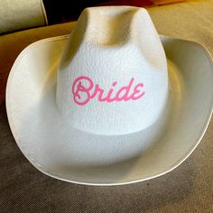 Hat From Etsy. Unfortunately Didn’t Ship In Time So Has Never Been Worn Before! Cute For A Bachelorette Party! Fitted White Hat For Country Events, White Hats For Western-themed Summer Events, White Hat For Western-themed Spring Events, White Mini Hats With Short Brim For Country Events, Fitted White Hat For Western-themed Events, White Curved Brim Mini Hat For Country Events, White Western Mini Hats For Country Events, Fun White Wide Brim Hat, Bride Cowboy Hat