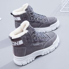 These winter boots are made of synthetic fur. The inner is thick and dense, which can keep you warm for a long time. Wearing these snow boots, the feet will warm up and quickly accumulate heat. This pair of boots can effectively provide warmth to your feet, allowing you to walk freely in winter. Two Colors Available: Black or Brown Outsole Material: Rubber Heel Height: Med (3cm-5cm) With Platforms: Yes Platform Height: 3-5cm Closure Type: Lace-up Trending Shoes For Men, Luxurious Shoes, Womens Suede Boots, Black Shoes Men, Best Shoes For Men, Winter Shoes For Women, Mens Shoes Casual Sneakers, Shoes High, Women Sneakers