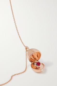 Fabergé's 'Essence' necklace is inspired by the brand's famous 'Imperial' eggs. Crafted from 18-karat rose gold, it's studded with sparkling brilliant-cut diamonds and opens to reveal a heart-shaped Mozambican ruby sourced from a Gemfields mine - the brand supports local communities and works with conservation NGOs in Africa to minimise environmental impact. Luxury 14k Rose Gold Oval Jewelry, Luxury 14k Rose Gold Gemstone Jewelry, Fine Jewelry Round Pendant Necklace For Evening, Timeless 14k Gold Necklace For Evening, Refined Rose Gold Polished Jewelry, Refined Rose Gold Jewelry With Polished Finish, Exquisite 14k Rose Gold Jewelry, Luxury Jewelry With Detachable Pendant For Formal Occasions, Luxury Jewelry With Detachable Pendant For Formal Events