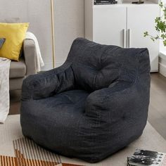 a bean bag chair sitting on top of a rug