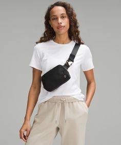 Phone, keys, wallet. Keep them close in this versatile belt bag that helps you get out the door and on to your next adventure. Designed for On the Move. Bag dimensions: 19cm x 5.5cm x 13cm (7.5" x 2" x 5"):Strap length when fully extended: 106cm (41.7"):Volume: 1L. Exterior zippered pocket to secure your valuables. Interior pockets hold the essentials. Once you find your perfect fit, tuck the excess belt bag strap into the elastic loops. Lululemon Belt Bag With Cell Phone Pocket For On-the-go, Lululemon Belt Bag With Removable Pouch For On-the-go, Lululemon Belt Bag With Adjustable Strap For Daily Use, Lululemon Belt Bag With Adjustable Strap For On-the-go, Functional Lululemon Pouch Belt Bag, Lululemon Belt Bag With Removable Pouch, Lululemon Pouch Belt Bag For Travel, Lululemon Travel Belt Bag Pouch, Lululemon Everyday Pouch Belt Bag