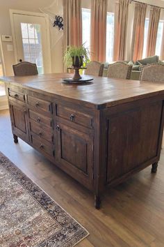 Custom Jordyn Reclaimed Wood Kitchen Island in Medium Walnut stain designed from our JordynBathroom Vanity. Contact us to customize for your space! Kitchen Cabinet Wood Colors, Repurposed Furniture For Kitchen, Chalon Kitchen, Reclaimed Kitchen Island, Rustic Kitchen Island Ideas, Barnwood Vanity, Walnut Kitchen Island, Reclaimed Kitchen, Valley Kitchen