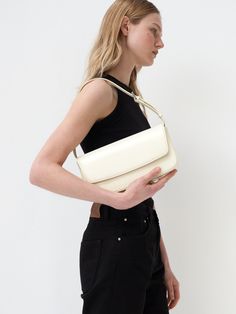 Editor's NotesHERVE's bag is classic and perfect for daily wear.- Light-weighted shoulder bag- Eye-catching flap magnetic closure detail- Adjustable strap in 6 steps- Inner open pocket- Feminine and minimal styleMeasurements(in.)- Size: 10.4in. (W) / 5.7in. (L) / 2.0in. (D)Composition & Care- Italian cow leather- Avoid direct heat and moisture- Professional cleaning is recommendedDesigner- by HERVE Everyday Classic Box Bag With Detachable Strap, Classic Everyday Box Bag With Detachable Strap, Classic Baguette Bag With Detachable Strap For Everyday Use, Classic Everyday Shoulder Box Bag, Classic Everyday Box Shoulder Bag, Classic Everyday Shoulder Flap Bag, Classic Bag With Single Shoulder Strap For Daily Use, Classic Baguette Bag With Detachable Strap For Daily Use, Classic Single Shoulder Strap Bag