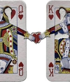 two playing cards that have been made to look like king and queen of hearts on them