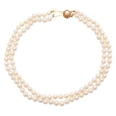 A vintage cultured pearl necklace set with a 14 karat gold clasp. The two-strand necklace is strung with cultured pearls and fastened to a beautiful 14 karat gold clasp. The clasp has a pearl set in the center, while the gold is designed with sloping notches. The pearl necklace is versatile and can be worn for a wedding, anniversary or any other occasion. The necklace is in beautiful condition. Marked, tested as 14k gold. Measurements: Length 42 cm Weight: 59 grams The necklace will be gift-wrapped in a black and gold Heztia presentation box. If you have any questions about this piece or if we can help you with any of our other items, please feel free to contact us. Beaded Pearl Necklace, Multi Strand Beaded Necklace, Pearl Strands Necklace, Pearl Necklace Set, Cultured Pearl Necklace, Pearl Set, Akoya Pearls, Freshwater Cultured Pearls, Pearl Diamond