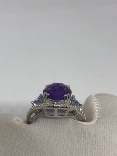 Hand made vintage deep amethyst with Purply blue natural Tanzanite and white Sapphire ring All hand made set in Sterling Silver Size 7 My jeweler can re size this for a $10-$20 fee to any size. All rings are shipped in a nice gift box. Check out our over a THOUSAND great reviews Engraving is $4 per letter and is not always perfect depending on the piece. It can take a few days if the jeweler is busy. This is payable to Paypal Judithsltd@gmail.com White Sapphire Ring, Amethyst Gem, Blue Tanzanite, Purple Band, Natural Tanzanite, Favorite Rings, White Sapphire, Amethyst Ring, 925 Sterling Silver Ring