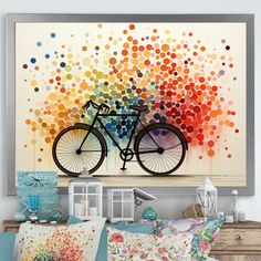 a bicycle is painted on the wall above a bed with pillows and pillowcases